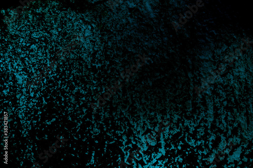 Abstract texture background. Black concrete wall with dark blue or turquoise color. Copy space, horrible or night atmosphere