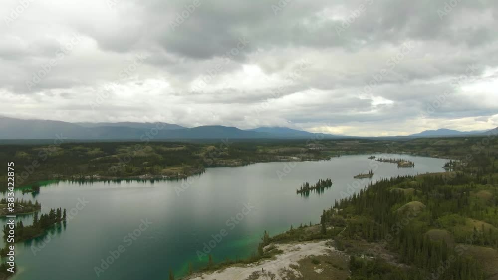 Beautiful View of Scenic Lake, Islands and Forest in Canadian Nature. Aerial Done Shot. Lewes Lake, South of Whitehorse, Yukon, Canada. 4K Beautiful View of Scenic Lake, Islands and Forest in Canadian Nature. Aerial Done Shot. Lewes Lake, South of Whitehorse, Yukon, Canada. 4K