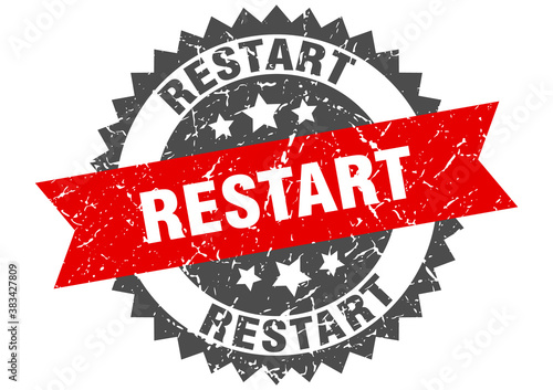restart stamp. grunge round sign with ribbon