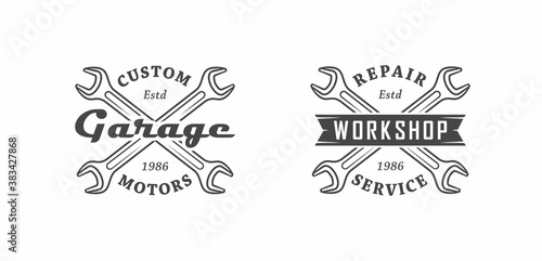 Set of black and white illustrations of crossed wrenches, vintage ribbon and text on a white background. Vector illustration for logos, emblems. Service and repair. Advertising garage, workshop.