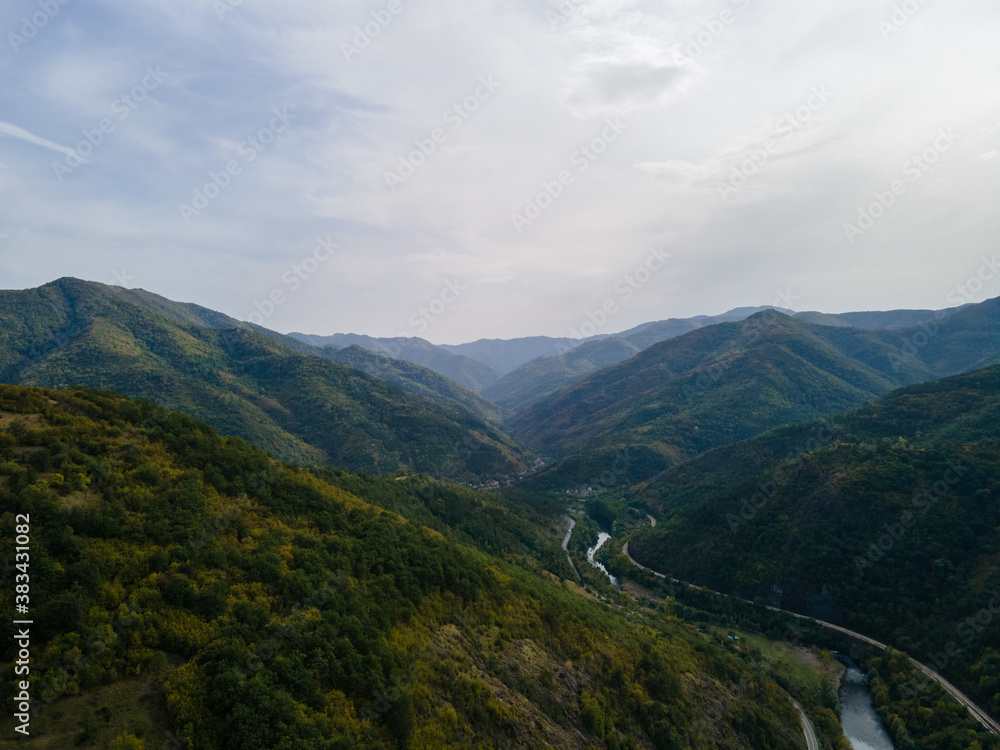 Aerial drone view of valley road in the mountains
