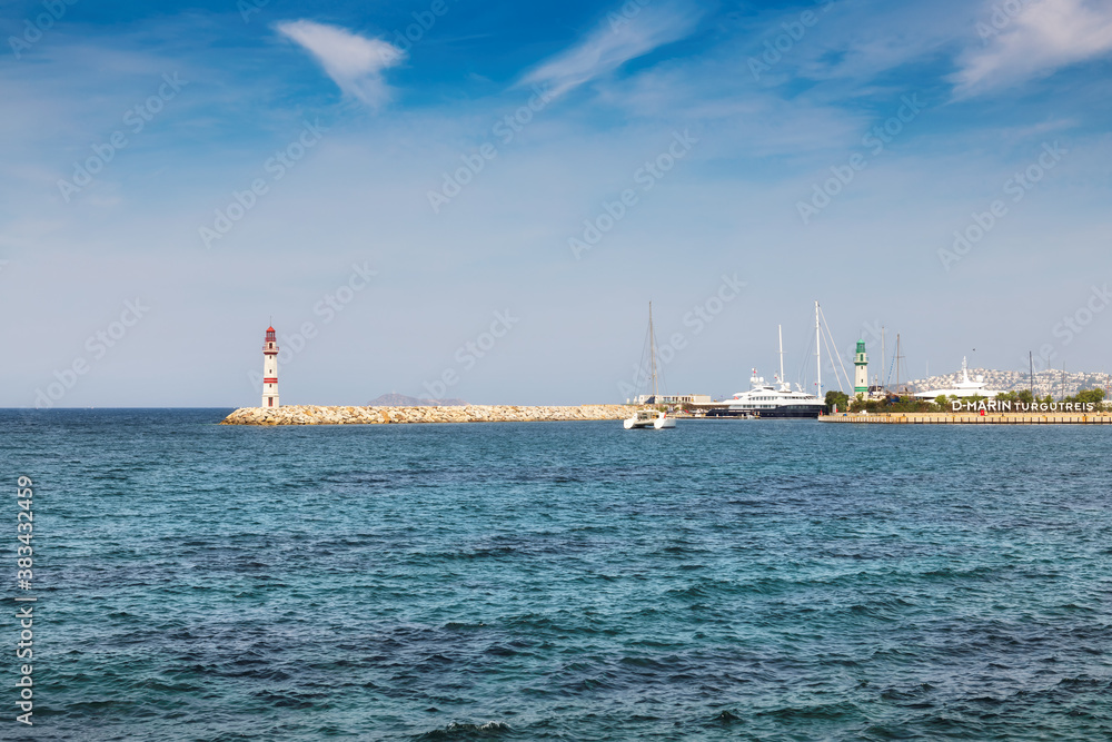 Turgutreis Lighthouse at sunny day in Bodrum, Turkey.
