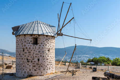 Old windmill in autumn sunny day, Bodrum, Turkey. 