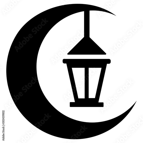 
Crescent with lantern hanging showing Ramadan Kareem
