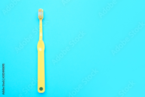 Tooth brush on color background