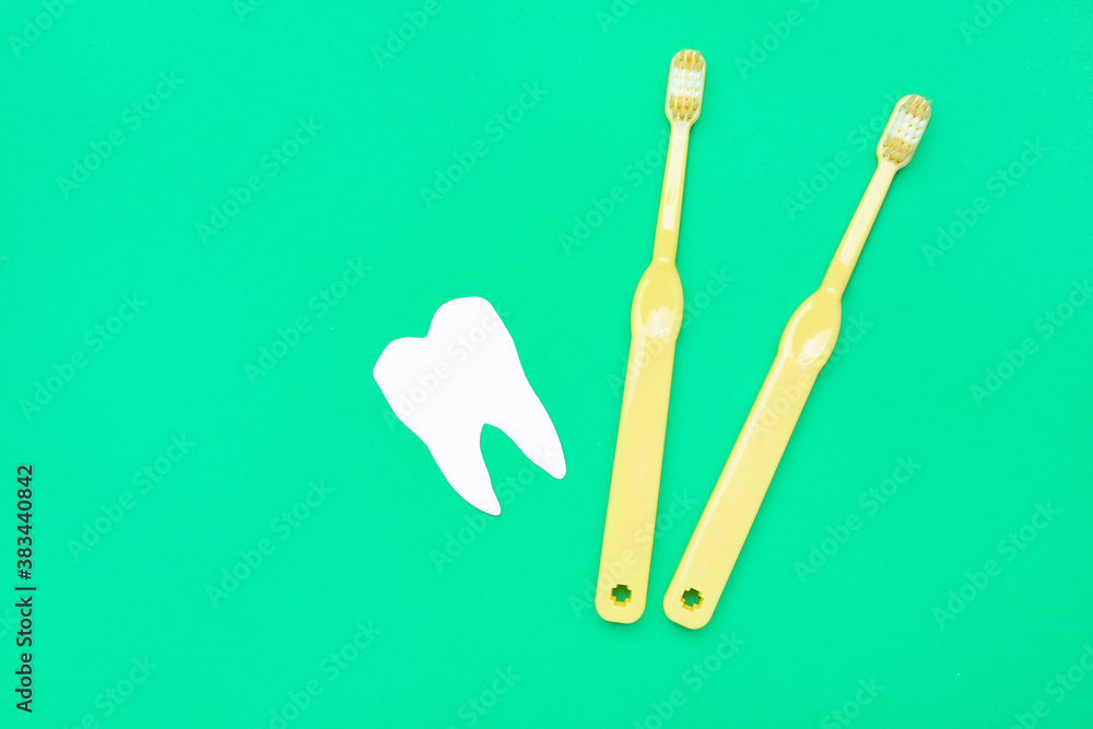 Tooth brushes on color background Tooth brushes on color background