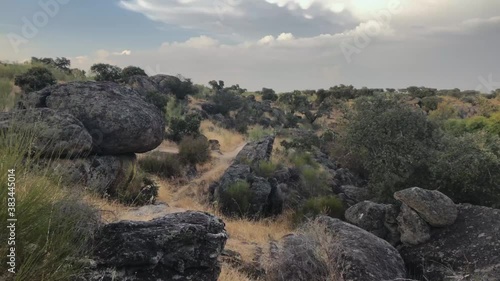 Panning in the place called El Rugidero in the Cornalvo Natural Park, in the Spanish province of Badajoz. A camera with tripod can be seen photo