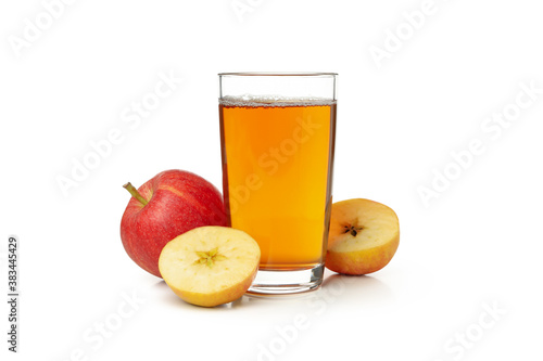 Glass of apple juice isolated on white background