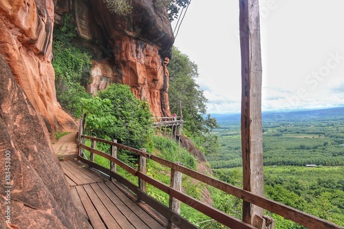Wooden walkway on sandstone mountains at Phu thok temple Sri Wilai district Bueng Kan, Thailand.