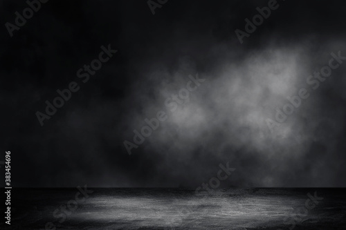 Empty space of Concrete floor grunge texture background with fog or mist and lighting effect.