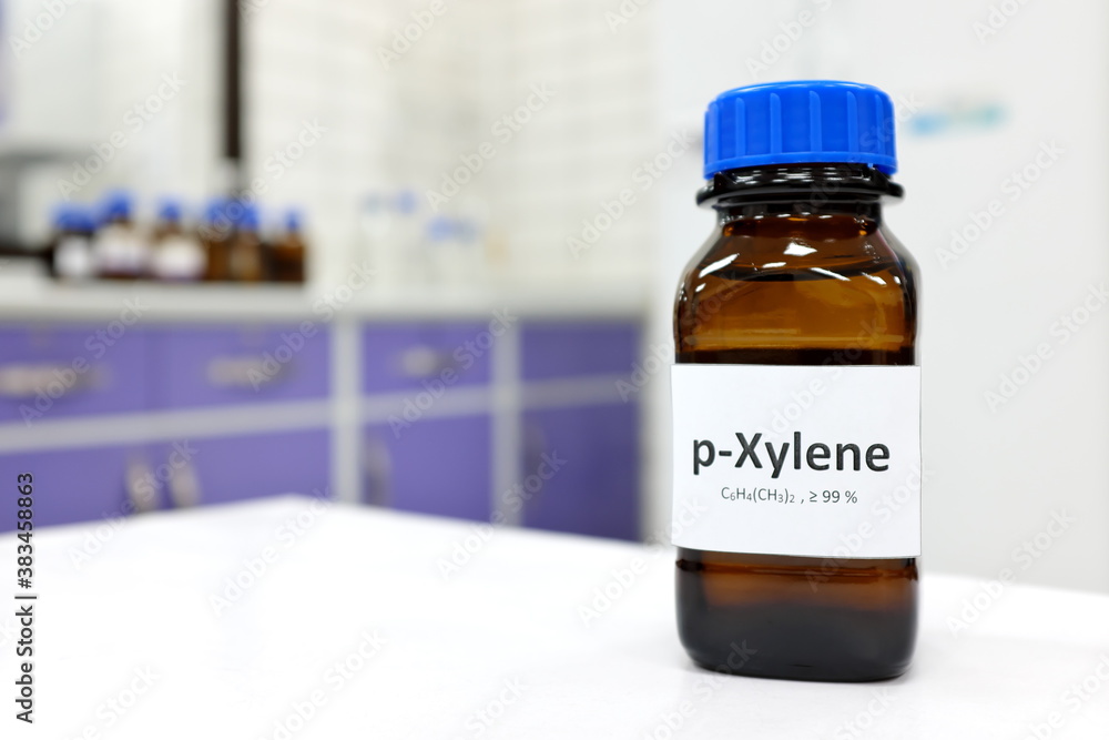 Selective focus of xylene liquid chemical compound in dark glass bottle