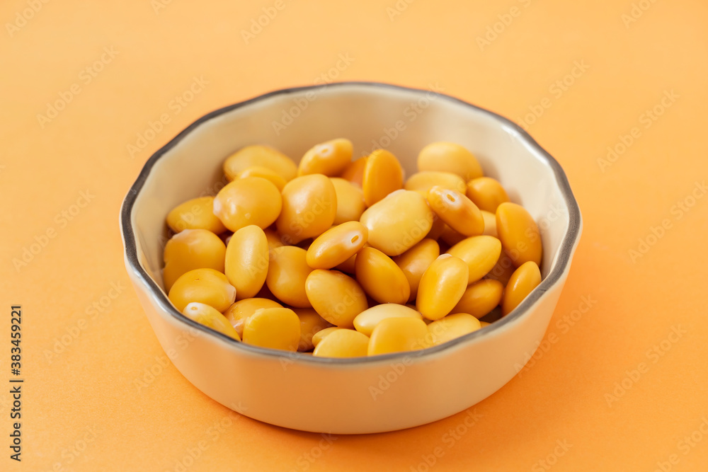 salted lupins in small light brown bowl salted lupins in small light brown bowl