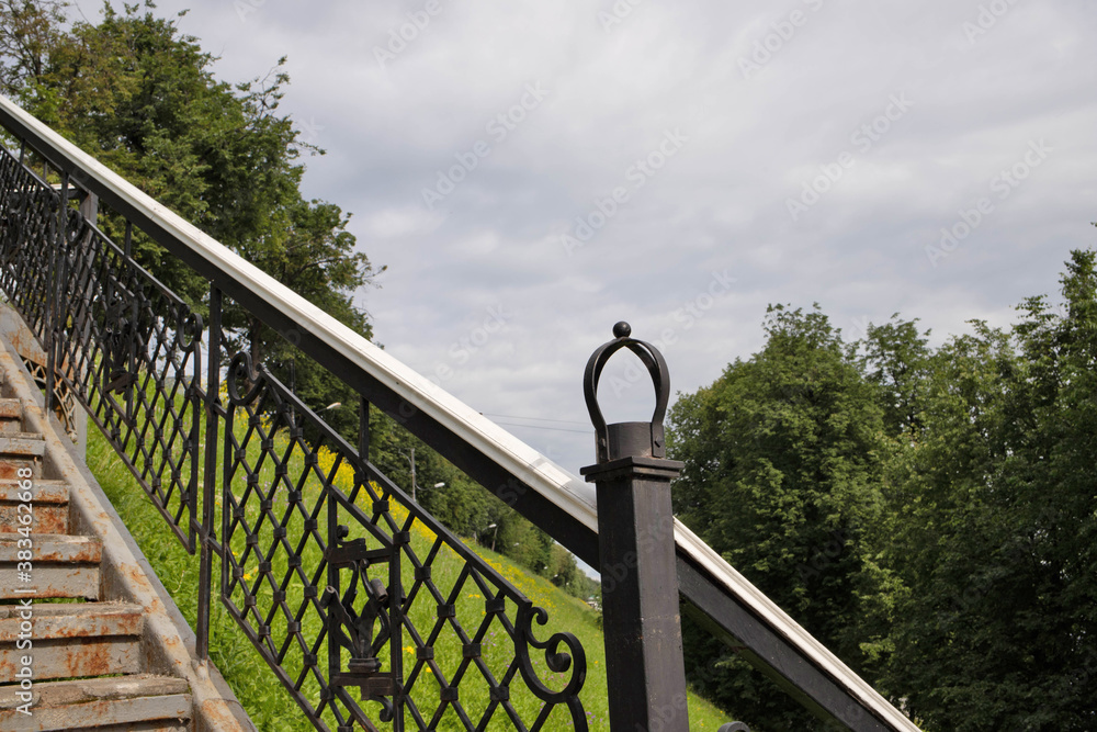 Yaroslavl. Beautiful old fence on the Volga embankment. Bright summer day.