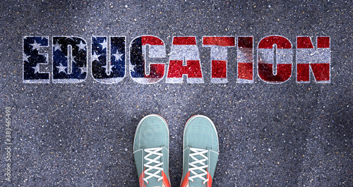 Education and politics in the USA, symbolized as a person standing in front of the phrase Education  Education is related to politics and each person's choice, 3d illustration photo