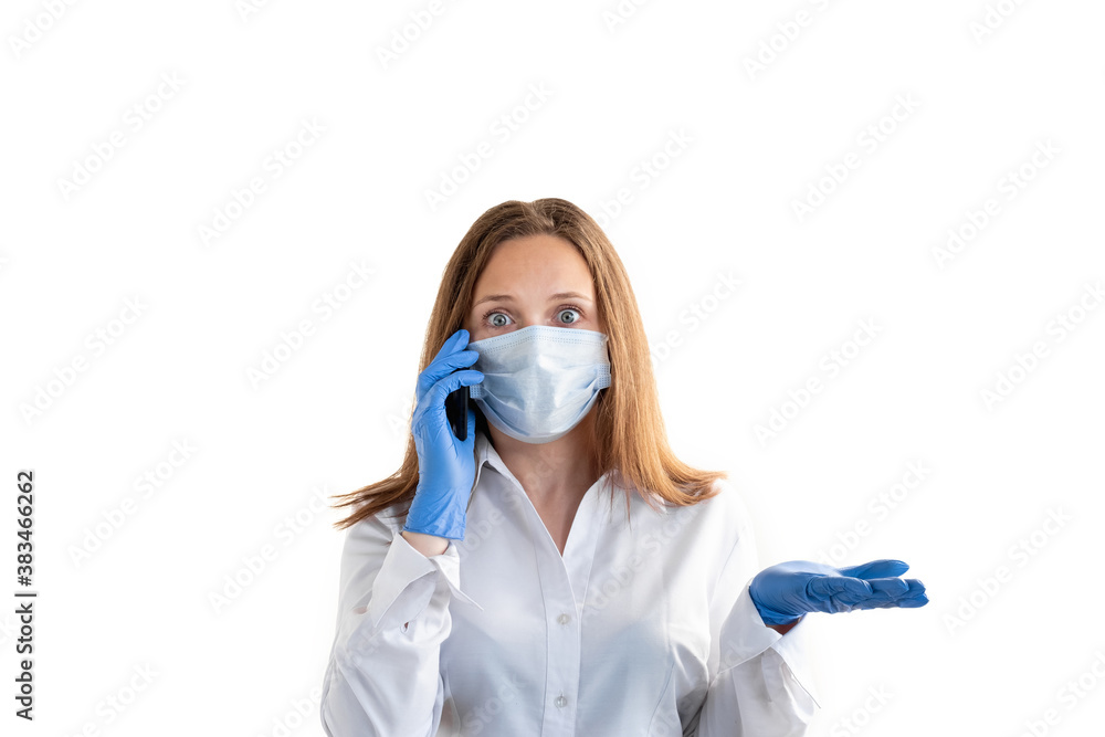 Surprised business woman. Personal offer. Covid-19 restriction. Open palm. Shocked lady in protective mask gloves talking mobile phone looking at camera isolated on white. Surprised business woman. Personal offer. Covid-19 restriction. Open palm. Shocked lady in protective mask gloves talking mobile phone looking at camera isolated on white.