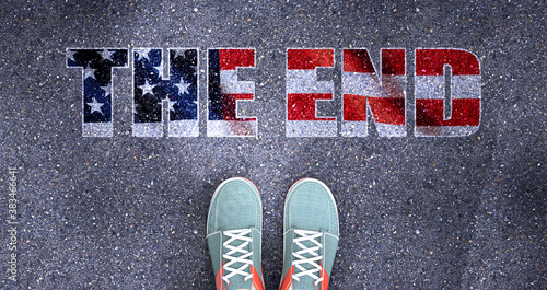 The end and politics in the USA, symbolized as a person standing in front of the phrase The end  The end is related to politics and each person's choice, 3d illustration photo