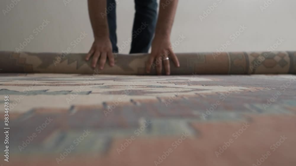 the man who rolls the carpet to move the man who rolls the carpet to move