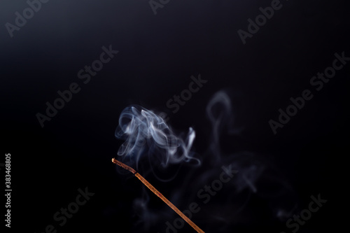 Εκτύπωση καμβά Incense stick with a wisp of smoke. On a dark background