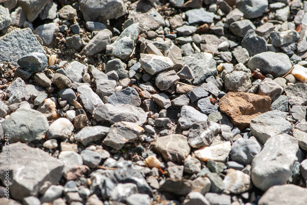 Background image of small rocks on village road