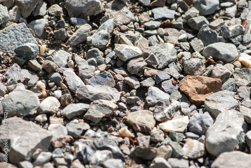 Background image of small rocks on village road