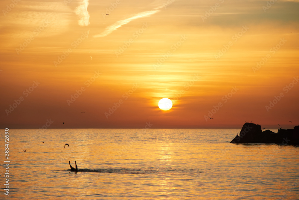 Barceloneta beach at sunrise in Barcelona, Spain