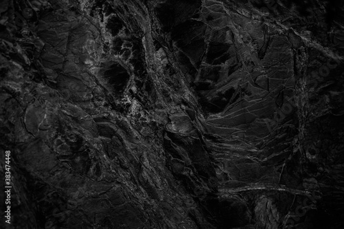 Black and white abstract background. Black stone background. Monochrome rock texture. Marble effect.
