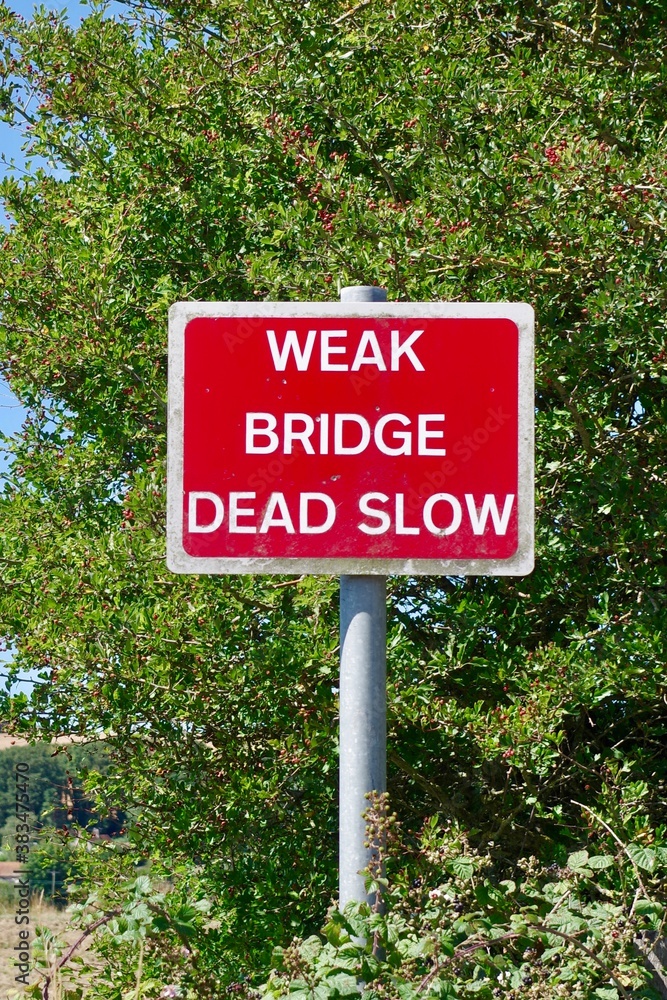weak bridge warning sign