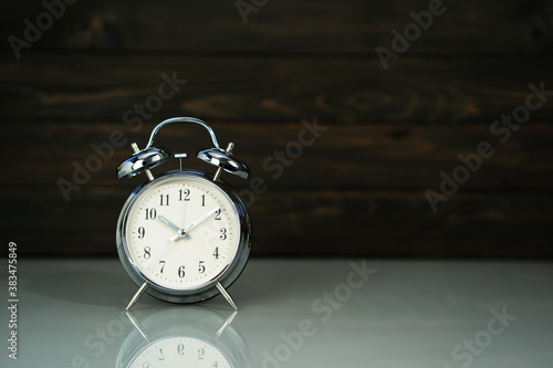 Retro alarm clock on table