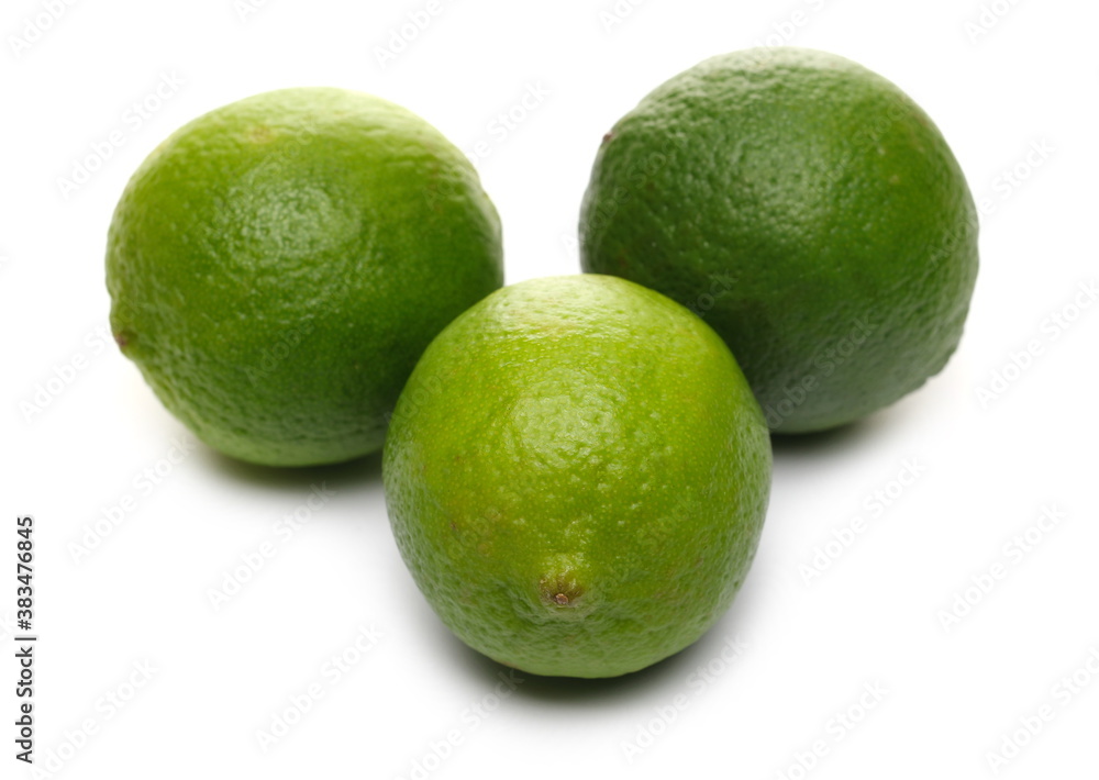 Green limes isolated on white background Green limes isolated on white background