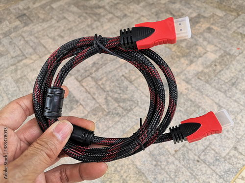 High quality signal cable outside covered with black braided thread. photo