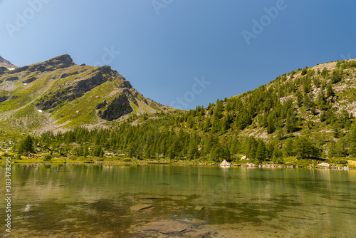 Morgex (Aosta), the wonderful Lake of Arpy, a mirror of water of glacial origin set in a beautiful alpine setting.