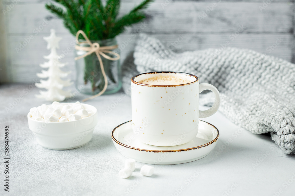 Cup of coffee, scarf and garland. Cozy Christmas composition. Scandinavian style Cup of coffee, scarf and garland. Cozy Christmas composition. Scandinavian style