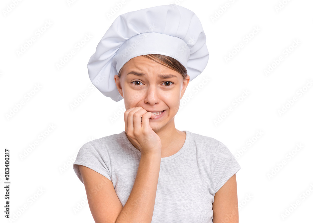 Teen girl in chef hat with emotions showing signs with hands, isolated on a white background. Teen girl in chef hat with emotions showing signs with hands, isolated on a white background.