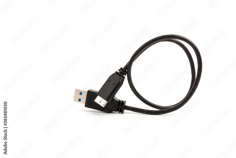 USB cable close up on white background. Charge, plugging, equipment and electricity USB cable close up on white background. Charge, plugging, equipment and electricity