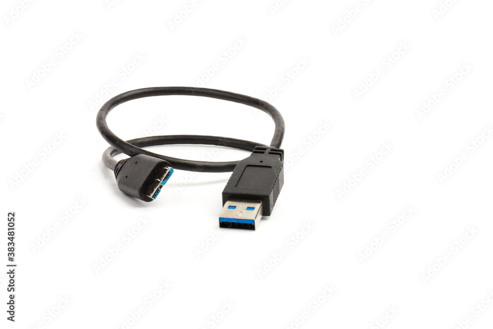 USB cable close up on white background. Charge, plugging, equipment and electricity