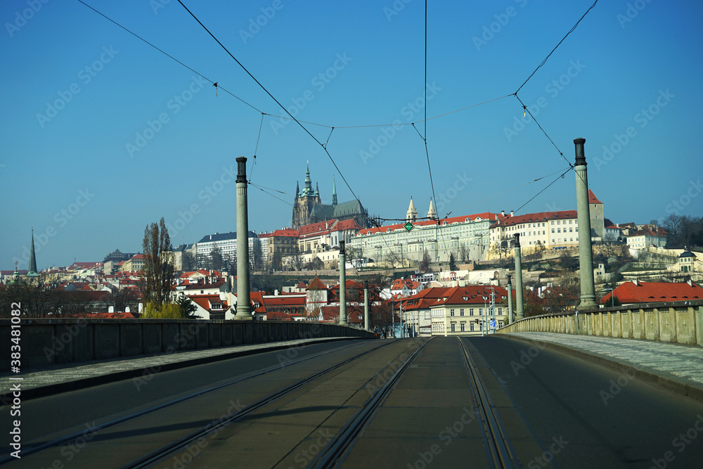 Prague historic castle view from empty bridge across Vltava River