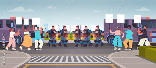 policemen in full tactical gear riot police officers controlling street protesters with placards during clashes demonstration protest mass riots concept full length horizontal vector illustration