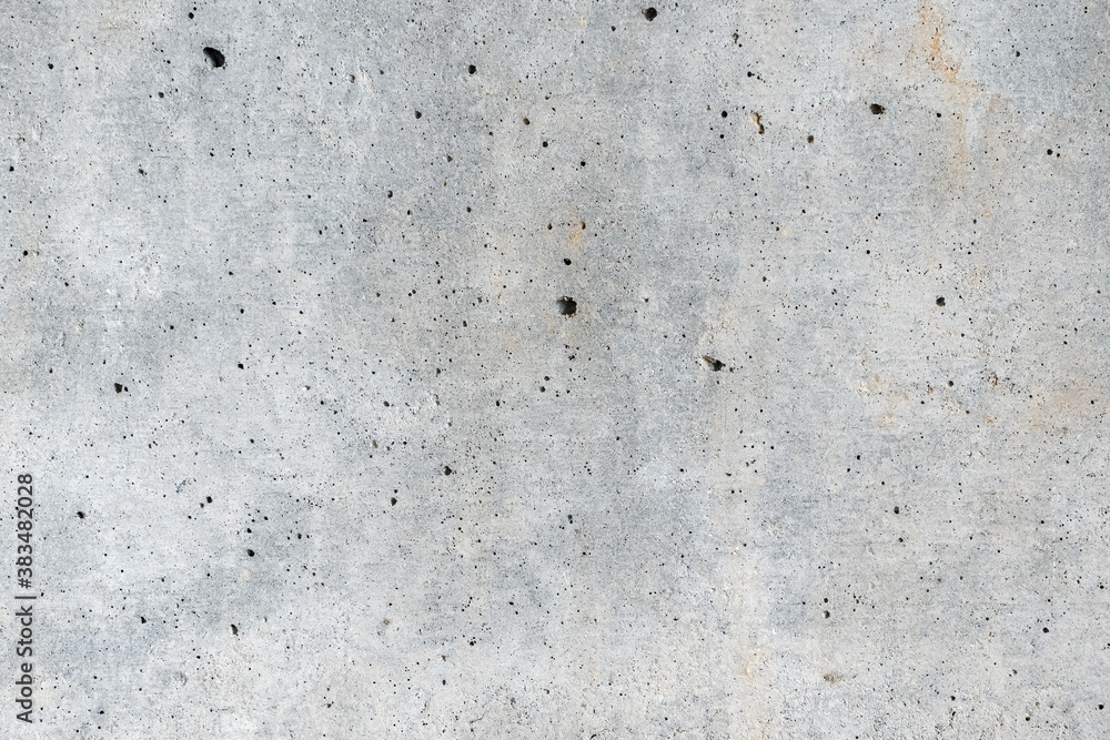 Gray concrete wall. The background is a blank wall