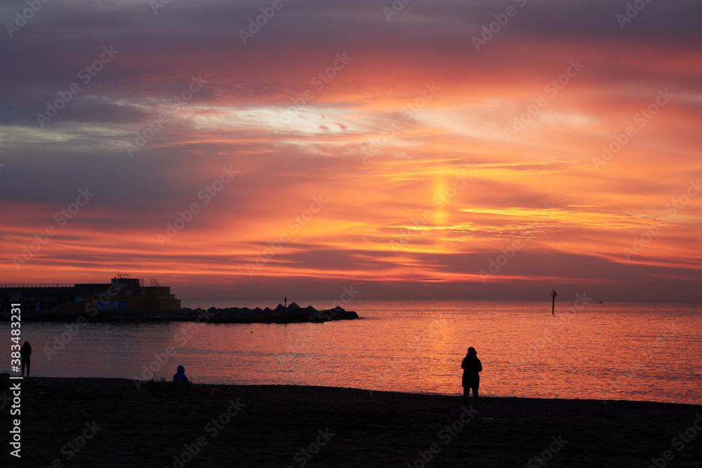 Barceloneta beach at sunrise in Barcelona, Spain