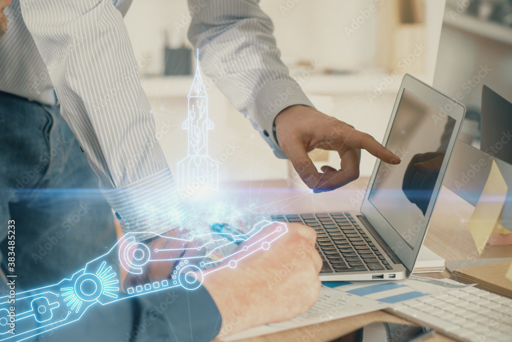 Start up drawings with businessman working on computer on background. Teamwork concept. Double exposure. Start up drawings with businessman working on computer on background. Teamwork concept. Double exposure.