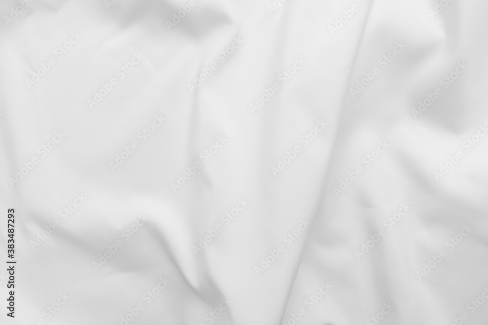 Abstract white fabric texture background. Cloth soft wave. Creases of satin. silk and cotton.