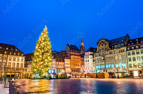 Christmas tree at the famous Christmas Market in Strasbourg at night - Alsace, France