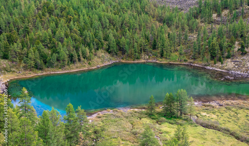 Fototapeta Naklejka Na Ścianę i Meble -  Turquoise mountain lake, view from the mountain