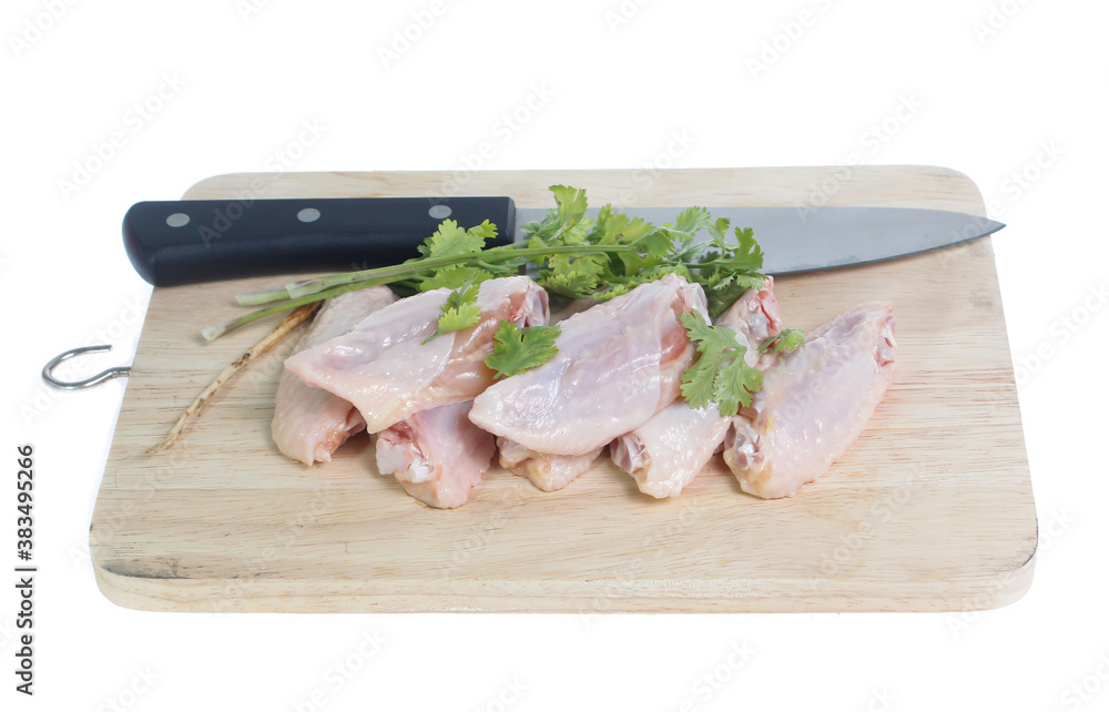 Raw chicken  on cutting board on white background