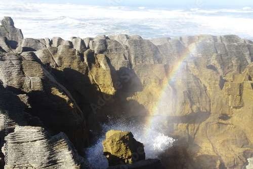 Rainbow over New Zealand's pancake rocks