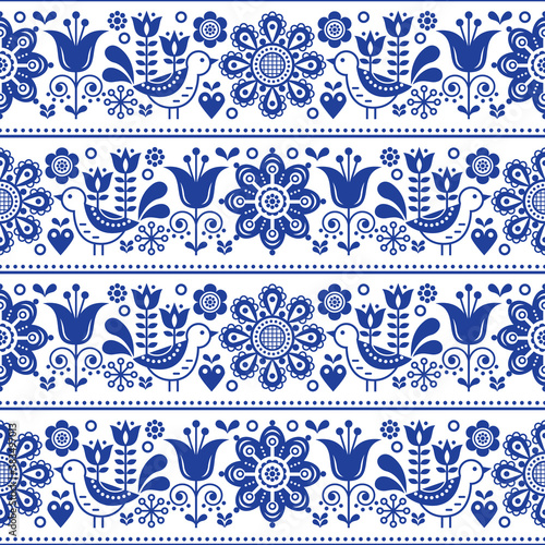 Scandinavian folk art seamless vector design with flowers and birds, cute repetitive white and navy blue pattern
  