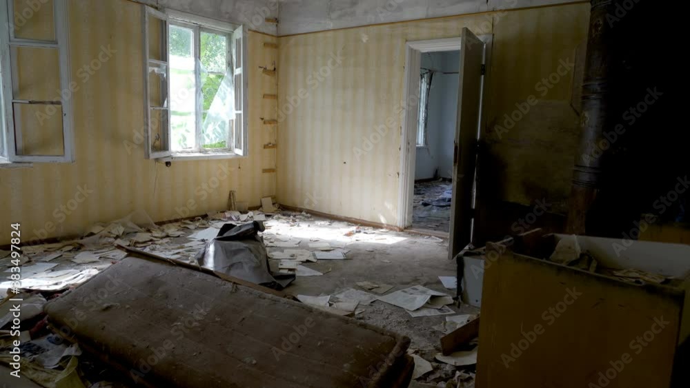 Lots of rubbles and garbage on the floor of the house Lots of rubbles and garbage on the floor of the house