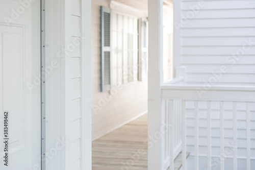 Modern white timber hampton timber style home balcony verandah porch outdoors holiday airy outdoors home white and bright