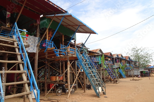 Houses on stilts in floating village Kampong Phluk in Cambodia