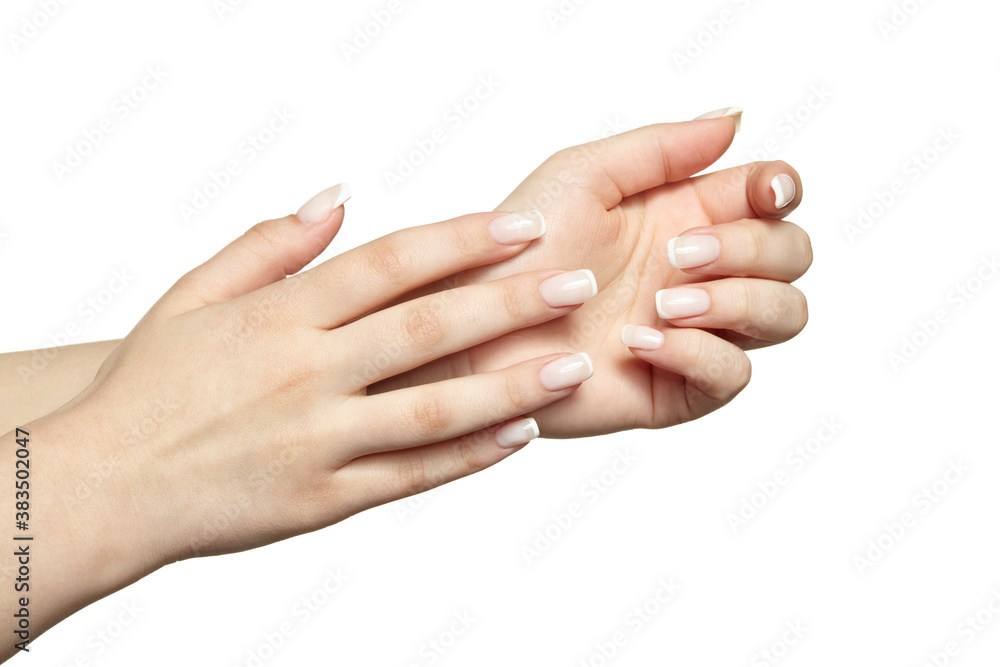 Female hands with woman's professional natural frenchnails manicure on white background